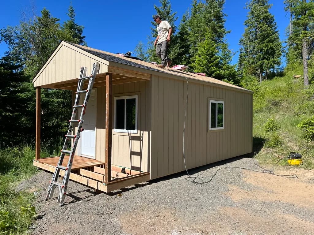 installing roofing on 10x20 cabin shed