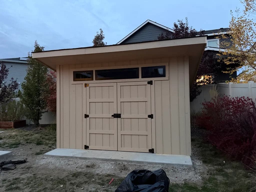 studio shed with double doors and windows