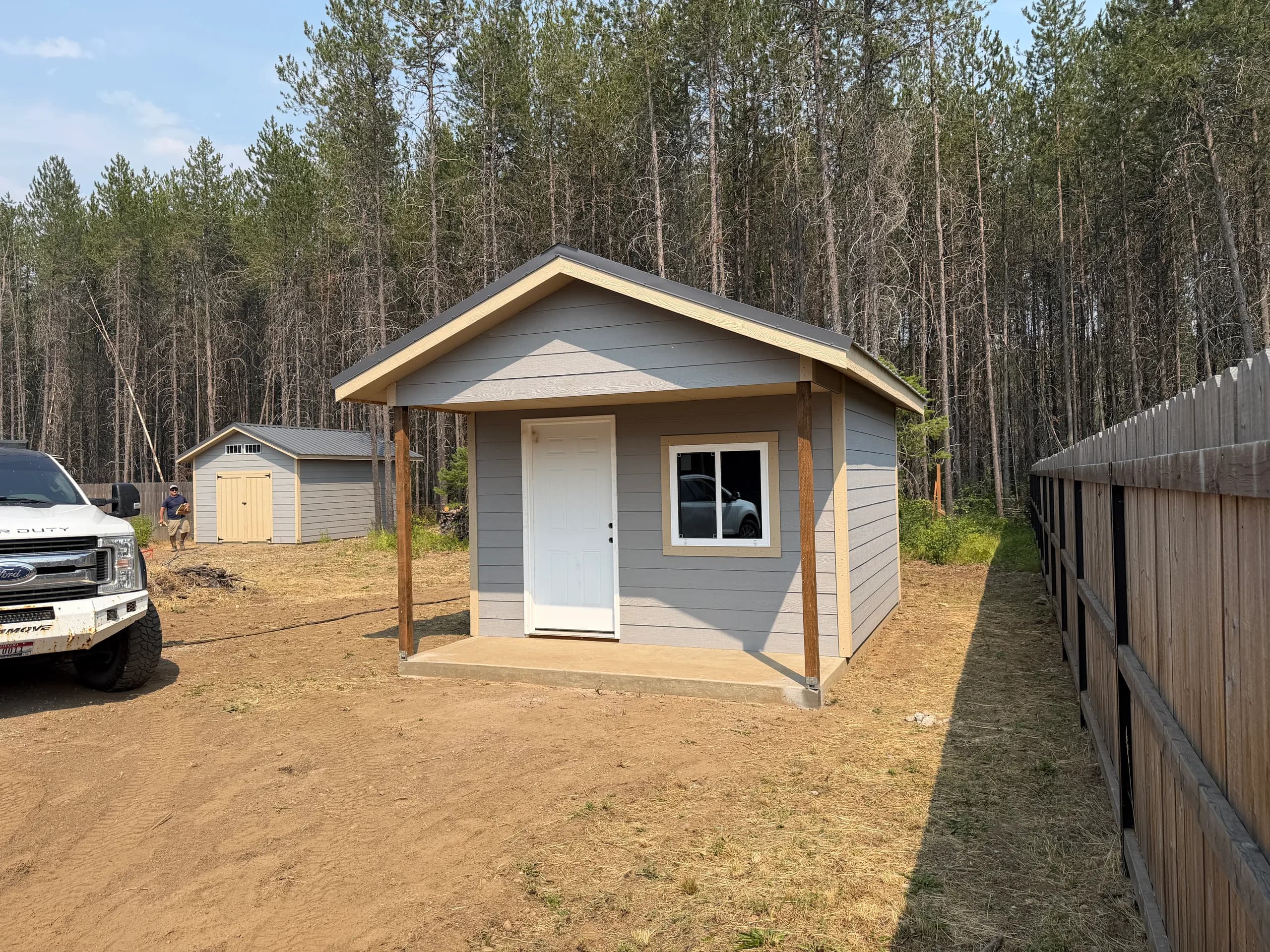 office shed with additional matching workshop shed in background
