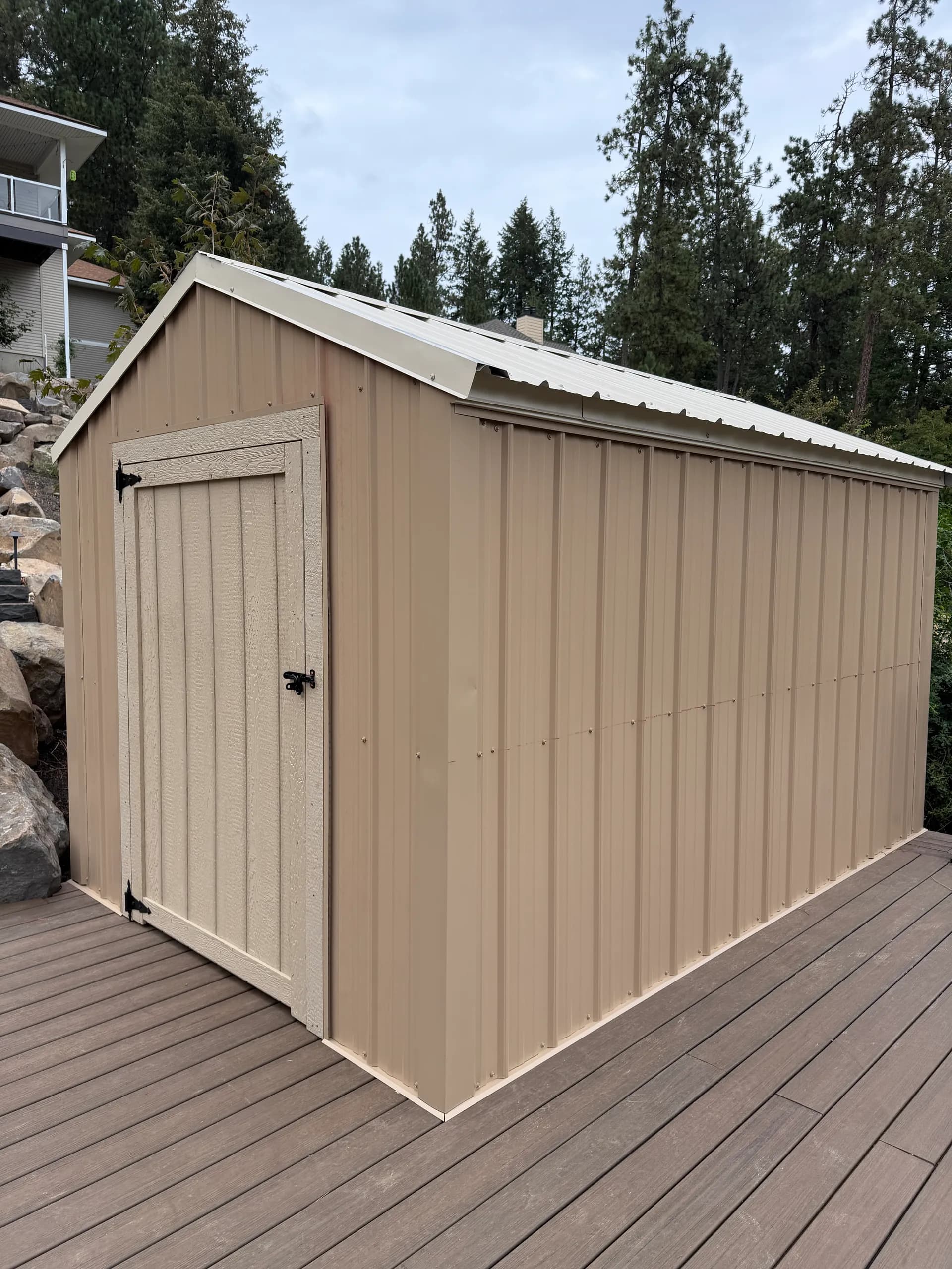 small shed on deck with metal siding