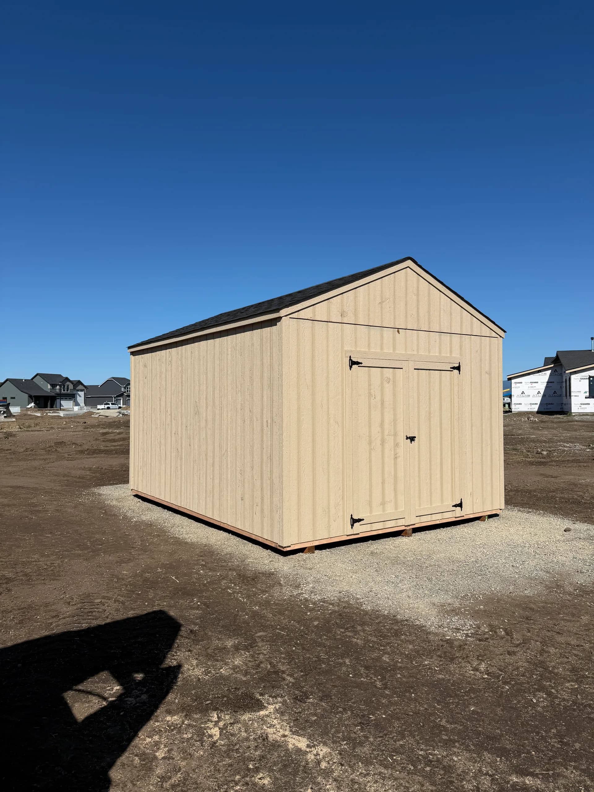 front corner view of 12x16 gable shed with black comp roofing