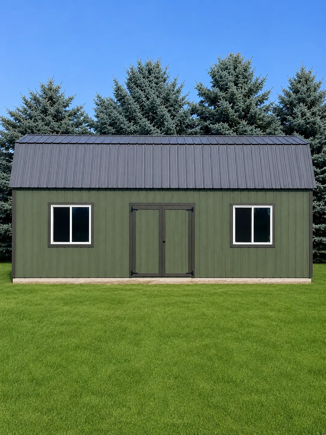 lofted barn storage shed with two windows in a green back yard
